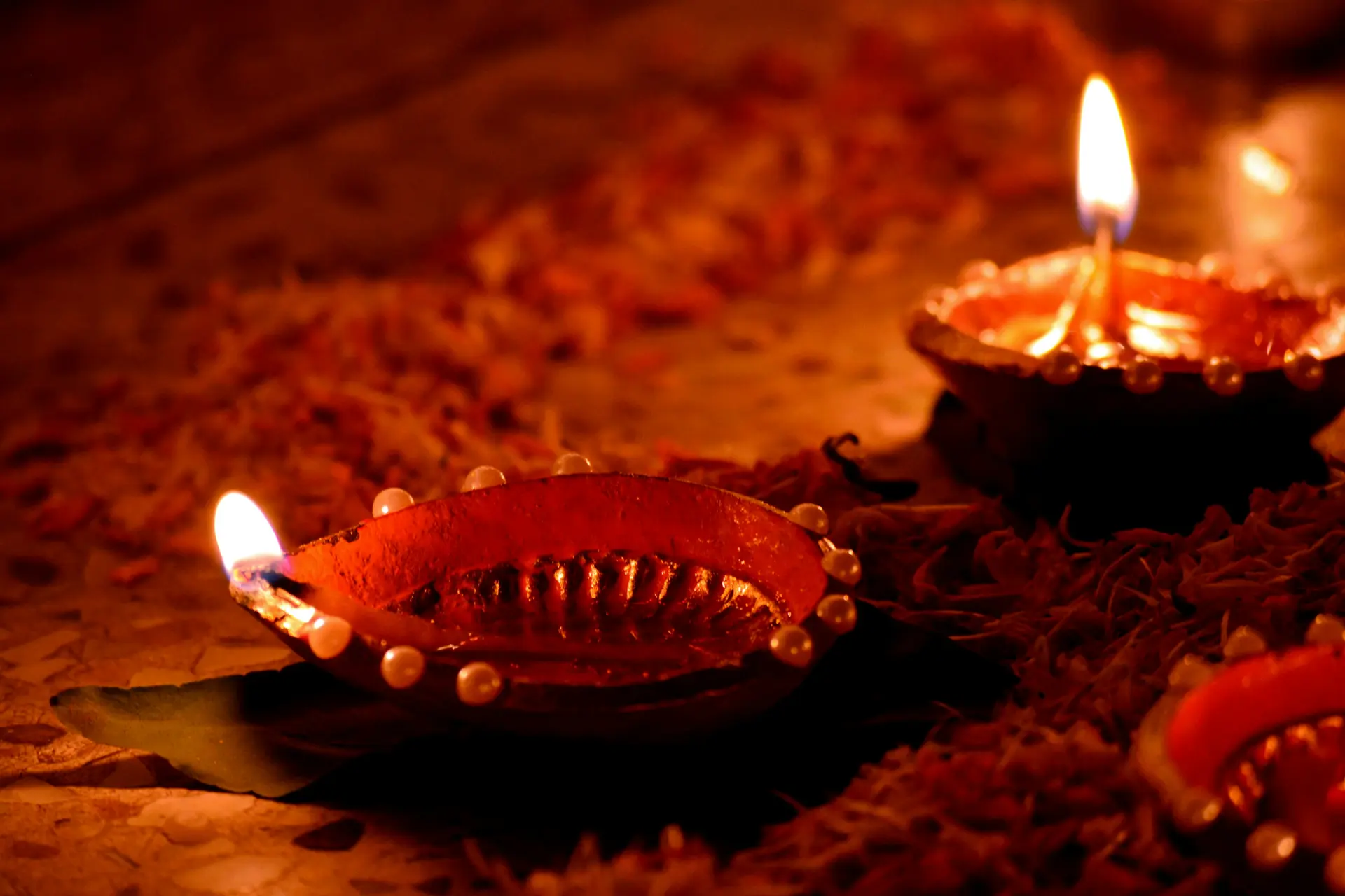 Diyas with flower petals